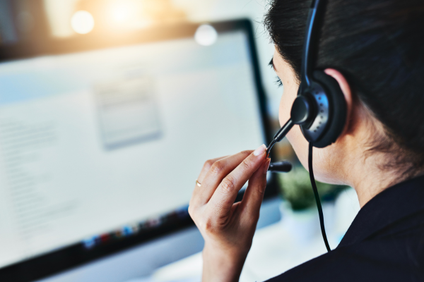 Call center agent using agent desktop with AI agent assist tools