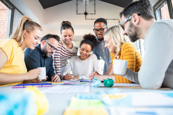 Team collaborating with charts and analytics